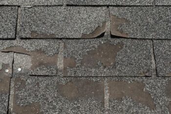 damaged roofing shingles replacement